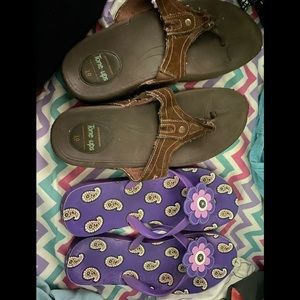 Two pairs of women’s flip flops- size 10